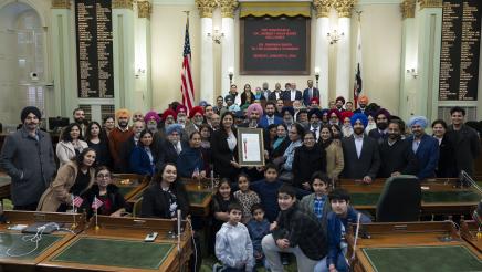 Presentation of Resolution to Dr. Swaiman Singh